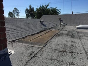 Shingle roof with exposed underlayment in Orlando