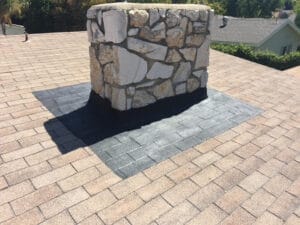 Stone pillar base on pavers in Orlando